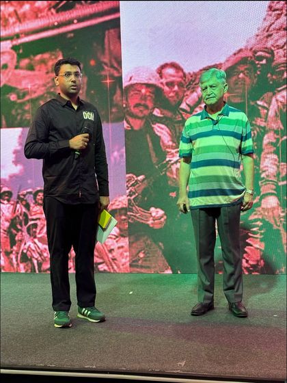 Our show caller on stage with a speaker during the TAFE conference. We provide direct support and guidance to ensure presentations are delivered effectively.