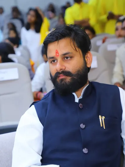 A candid moment during an award ceremony. While I am a teacher, I am also a lifelong student on this path of yoga.