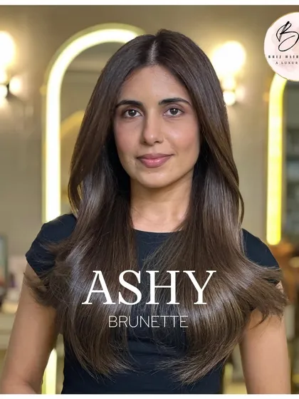 Ashy Brunette is one of my most requested looks. This image perfectly captures the cool, sophisticated tones that make this color so popular. It's a modern, chic option for those who want a change without going too light or warm.