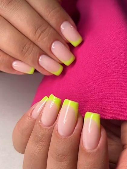 A close-up of our neon yellow French tip design on square nails. The vibrant color makes this classic style feel fresh and modern.