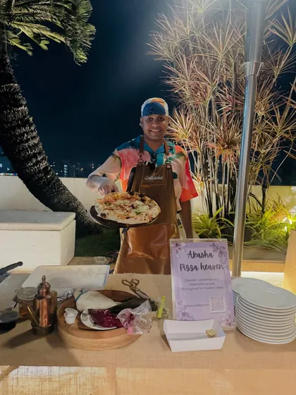 My complete pizza station at a baby shower. I bring everything needed, including plates and my custom sign, to create a professional and fun food experience.