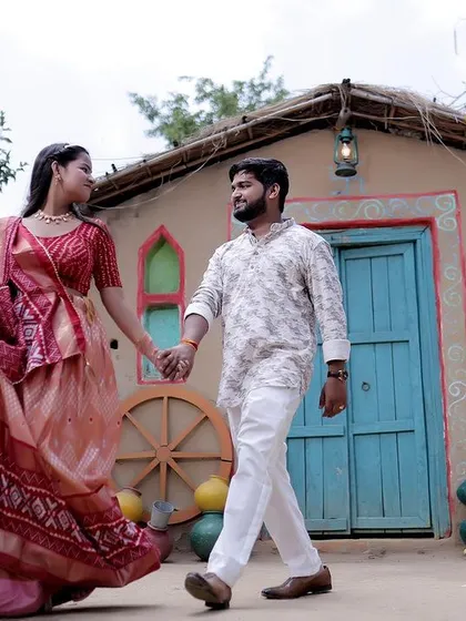 We bring an authentic desi vibe to life with our rustic village set. This pre-wedding shoot captures a candid moment against the backdrop of a traditional mud house, perfect for telling a story rooted in culture.