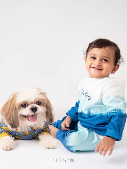 The final result. A perfect portrait of two best friends. Including pets in your child's photoshoot adds a wonderful, personal touch to the memories.