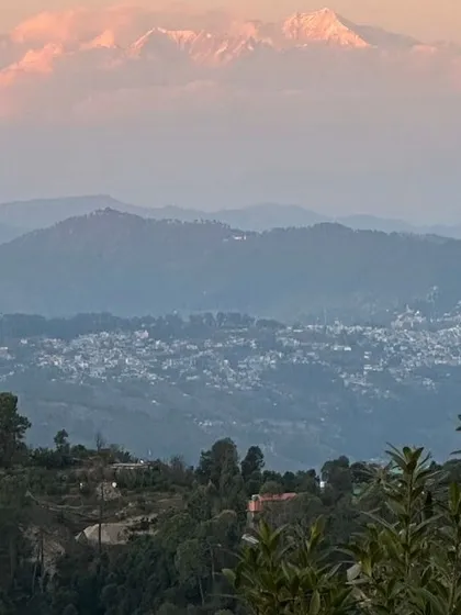 The Himalayan peaks at sunrise. This magical view is what greets our writers, setting a tone of wonder and possibility for the day ahead.