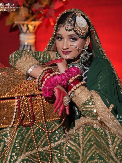 Posing with props like this ornate chest adds a story to the image. The makeup, with its bold lip and defined eyes, holds its own.