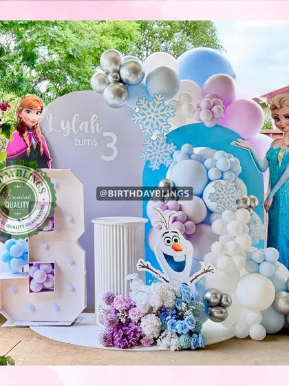 An outdoor Frozen-themed party that feels like a winter wonderland. I used cutouts of Elsa, Anna, and Olaf, along with snowflake details and a beautiful balloon arch in icy blues, purples, and whites.