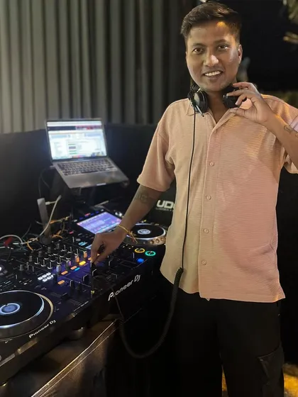 A candid moment where I am interacting with the camera. I believe in being approachable and connecting with the guests I'm playing for.