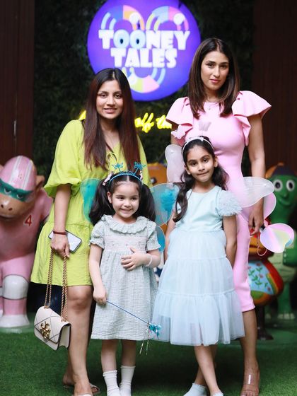 We were thrilled to host cricketer Mohammad Kaif and his family. Here, his wife Pooja poses with their daughter and a friend in front of our logo.