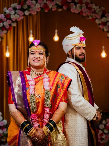 A candid shot of the bride and groom during their wedding ceremony. I love capturing the couple's expressions as they experience the rituals together.