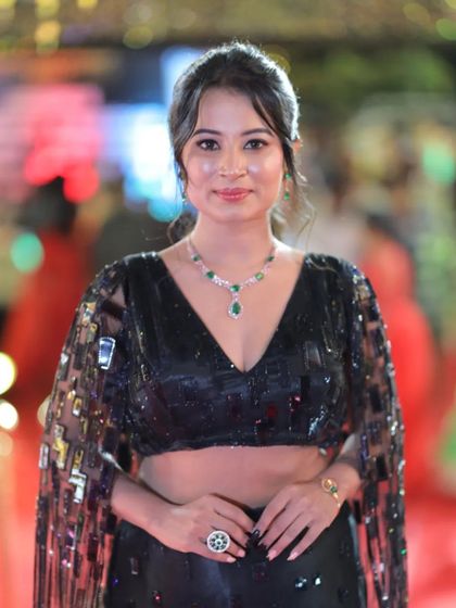 A poised and graceful shot of Anusha Rai on the red carpet.