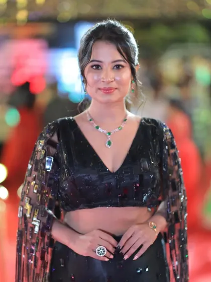 A poised and graceful shot of Anusha Rai on the red carpet.