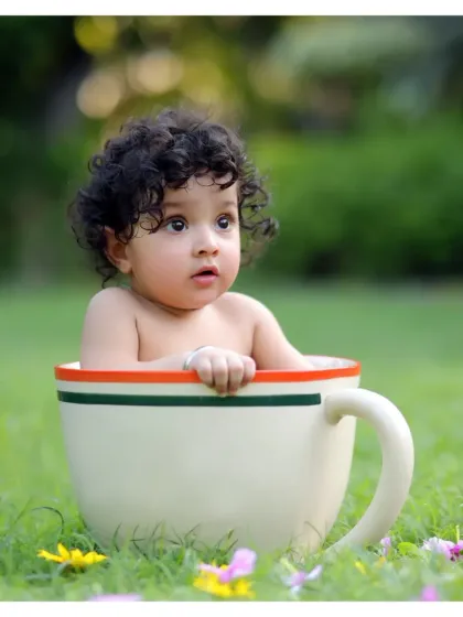 A cup of cuteness! Our unique teacup prop looks fantastic in an outdoor setting, creating a whimsical and memorable portrait for your baby.