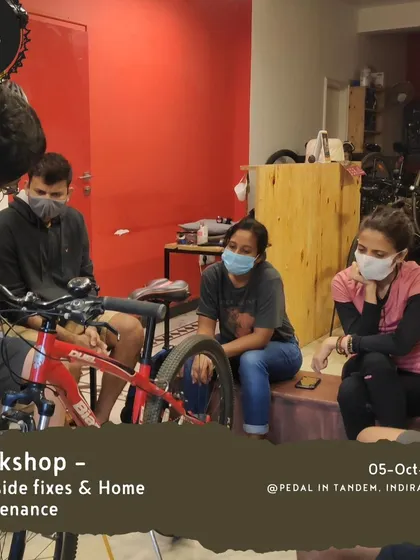 A group of riders learning together during a home maintenance workshop. The community atmosphere makes learning new skills less intimidating and more fun.