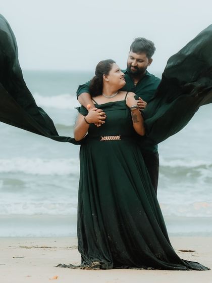 This shot shows the "flying" trail of the green gown, creating a beautiful frame around the couple for their pre-wedding photo.