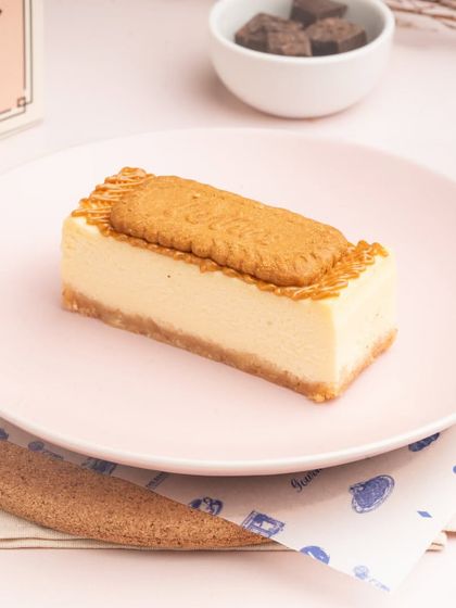 For a modern twist, I created the Lotus Biscoff Cheesecake. It has a creamy cheesecake base infused with Biscoff flavor and topped with a whole Biscoff biscuit.