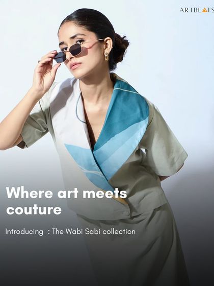 Where art meets couture. This image introduces the Wabi Sabi collection, featuring a model in the Kintsugi silk scarf top, a piece that blends imperfect beauty with high fashion.
