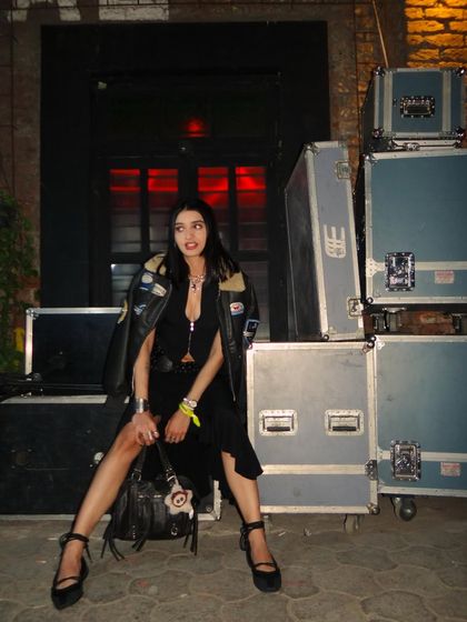 Taking a break on some equipment cases. Brand events often take place in cool, unconventional spaces that add to the overall experience.