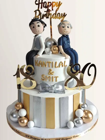 A dual birthday cake celebrating a grandfather's 80th and grandson's 18th birthday together. The silver and gold theme connects the two milestones beautifully.