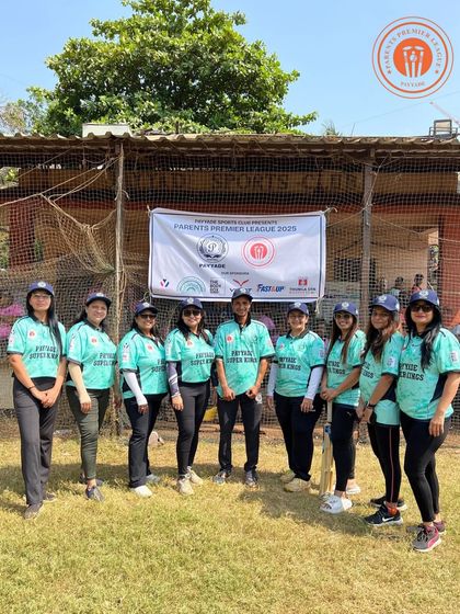 The women's team in turquoise jerseys poses proudly for a group photo at the PPL.