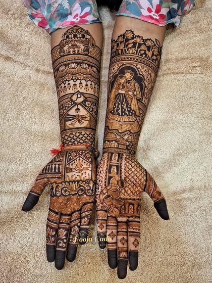 The full view of the custom design for the NRI bride, showing how personal elements like portraits and monograms are blended with traditional patterns.