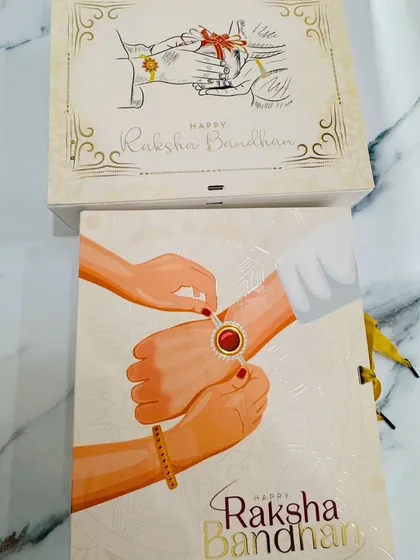 I offer a variety of box designs for Rakhi. This one features a lovely illustration of the Rakhi ceremony, making the gift even more meaningful.