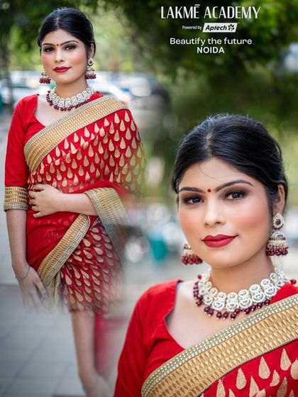 A classic red saree look created by one of our students. This demonstrates their mastery of fundamental techniques like creating a bold red lip and clean eyeliner.