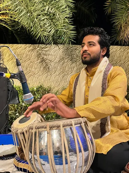 Lost in the rhythm of the tabla during an evening concert. Each performance is a new story, and I am grateful for every opportunity to share it.
