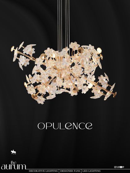 Named 'Opulence', this fixture is a celebration of intricate, nature-inspired design. The clustered, textured glass elements create a sparkling canopy of light, ideal for making a dramatic statement in a high-ceilinged living room.