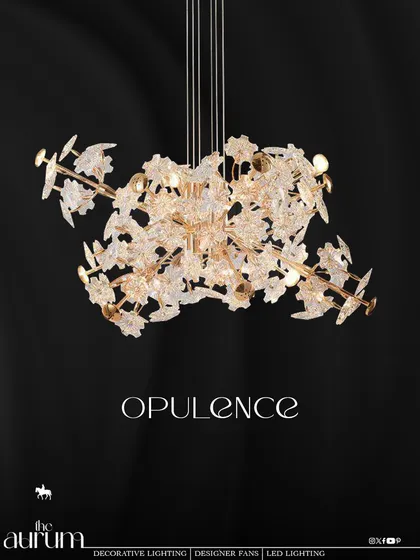 Named 'Opulence', this fixture is a celebration of intricate, nature-inspired design. The clustered, textured glass elements create a sparkling canopy of light, ideal for making a dramatic statement in a high-ceilinged living room.