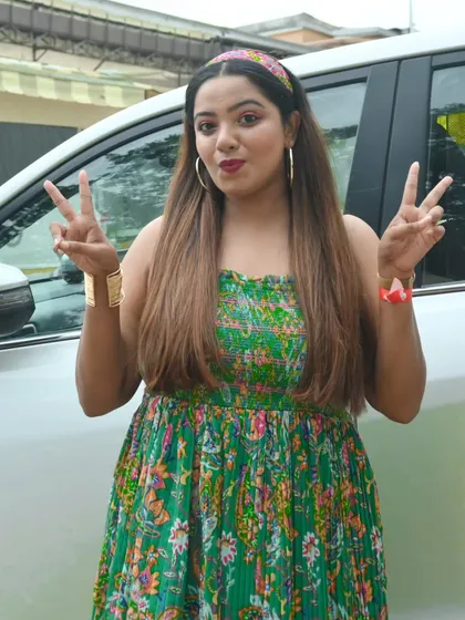 Double peace signs for double the energy. Ready to rock the stage for Day 1.
