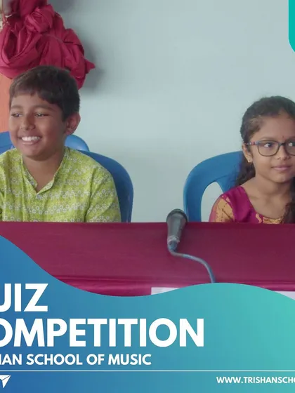 The joy of participation shines on our students' faces during the music quiz.