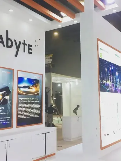The Rabyte booth is nearly ready, with its branding and informational posters already in place.