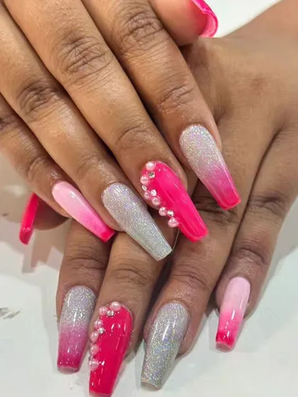 Another look at the vibrant pink ombre and silver glitter set, showing the detail of the pearl accents.
