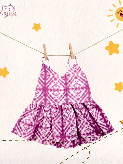 This pink shibori tie-dye top is perfect for little superstars. The vibrant color and unique pattern will make your little girl steal the spotlight at any party.