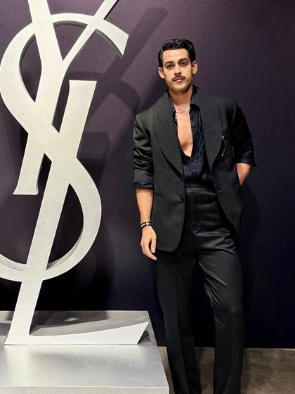 Giri Sawalkar exudes effortless style in a sleek, all-black SGM ensemble. Every detail, from the fit of the jacket to the drape of the trousers, is crafted to perfection for a timeless look.