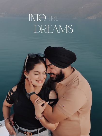 An intimate embrace on a boat in Rishikesh. This close-up shot, titled "Into the Dreams," perfectly captures the romantic essence of a pre-wedding shoot.