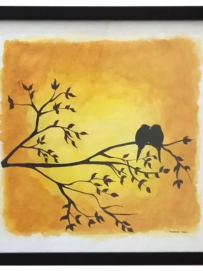 A simple silhouette can tell a powerful story. Here, two love birds sit on a branch against a warm, blended watercolor sunset. It’s a quiet, romantic moment captured in a 10x10 inch frame, perfect for celebrating love.