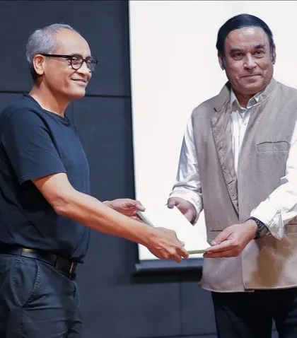 Receiving a token of appreciation after a lecture. It is always an honor to engage with students and faculty and to see their passion for the future of architecture.