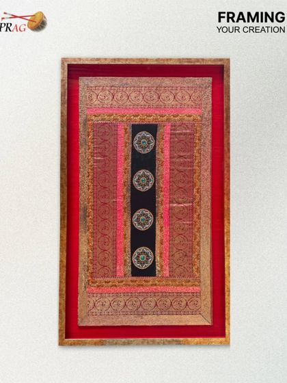 We specialize in framing traditional Indian textiles, like this intricate Tanjore piece. The antique gold frame and vibrant mount were chosen to complement the rich colors and detailed embroidery of the fabric.