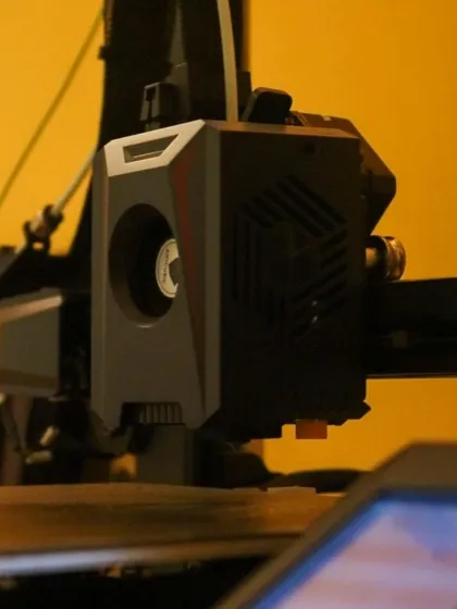 The extruder head of our 3D printer, ready to bring another digital design into the physical world.