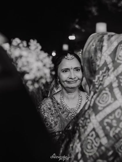 A mother's tearful, loving gaze at her daughter during the farewell.