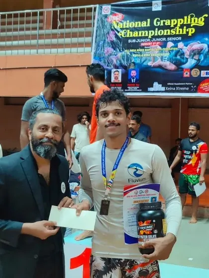 Receiving my gold medal, cash prize, and supplements from the event organizers and sponsors in Kerala. It's great to see the sport growing and getting support.