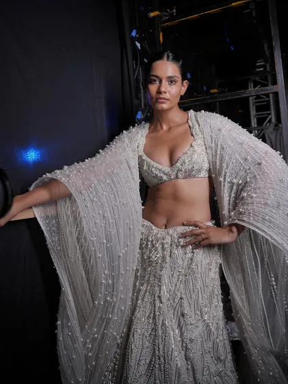 Backstage at FDCI India Couture Week for the visionary designer Gaurav Gupta. This look features my signature glass skin finish, designed to catch the light and complement the intricate details of the couture gown.