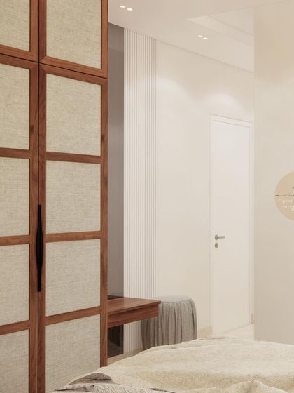 A detail of the wardrobe and dressing area in the mint green guest room.