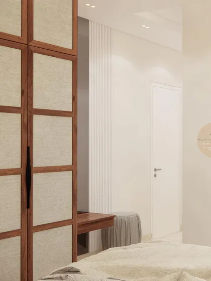 A detail of the wardrobe and dressing area in the mint green guest room.
