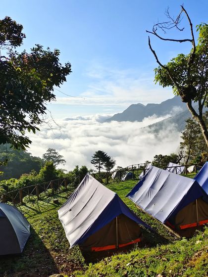 A duplicate shot of the campsite on a clear day above the clouds.