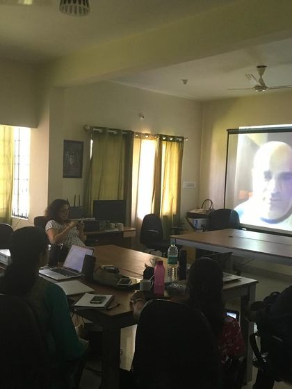 Technology connects us across borders. Here, Egyptian author Youssef Rakha joins a session via video call, bringing an international literary perspective to our writers.