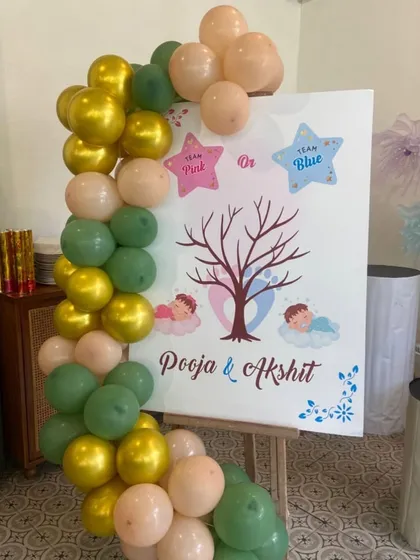 A fun gender reveal element for a baby shower, where guests can guess "Team Pink or Team Blue."