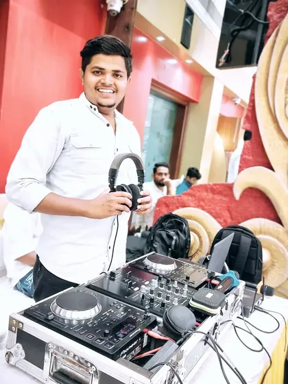 Ready to get the party started at a wedding reception. A professional setup and a deep understanding of music are key, but my real job is to read the crowd and create a vibe that makes your special day unforgettable.