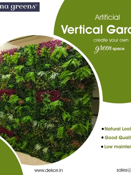 Create your own green space even in a small corner. This vertical garden uses a mix of ferns, broad leaves, and pops of color to make a bold statement.